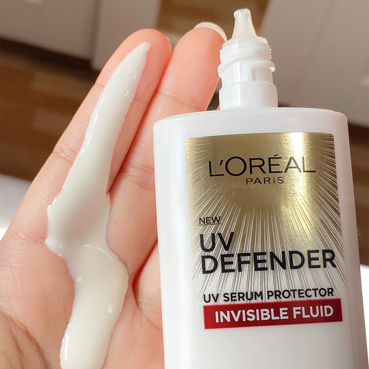 Kem chống nắng Loreal vạch đỏ UV defender serum invisible fluid 50ml